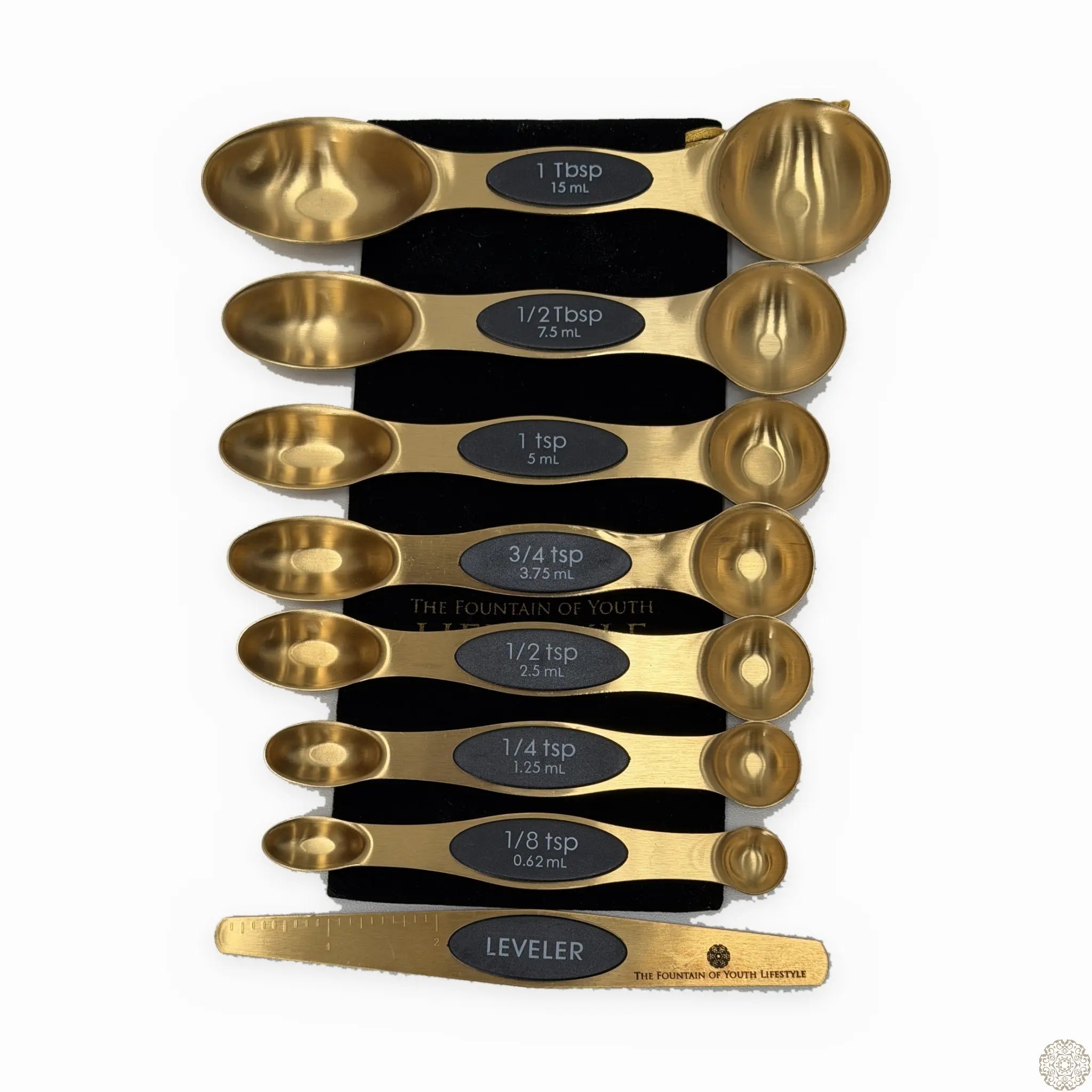 The Fountain of Youth Lifestyle Chef's Measuring Spoon Set - seven gold dual-ended magnetic spoons and leveler