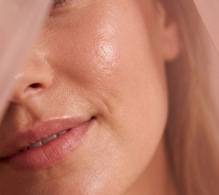 Close-up of a woman's natural skin in soft warm light