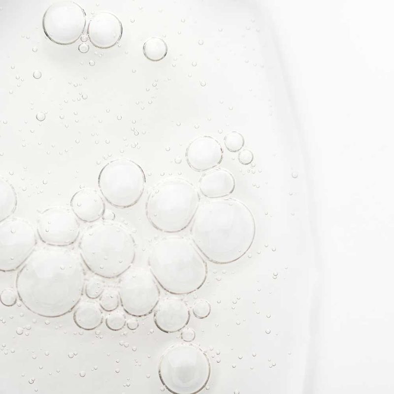 Close-up of clear gel cleanser texture with small bubbles